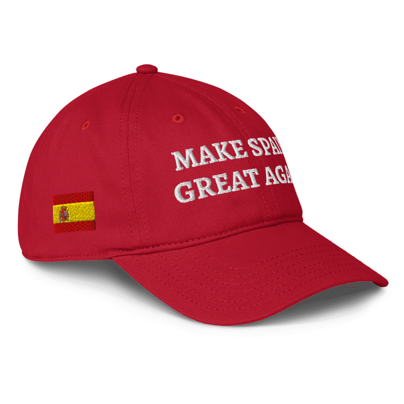 A red baseball cap with white embroidered text reading 'MAKE SPAIN GREAT AGAIN' and a small Spanish flag patch on the side, shown on a clean white background.