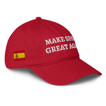 A red baseball cap with white embroidered text reading 'MAKE SPAIN GREAT AGAIN' and a small Spanish flag patch on the side, shown on a clean white background.