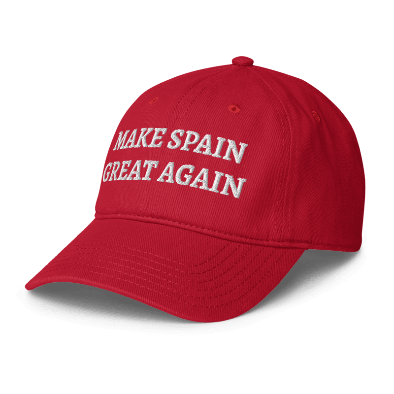 A red baseball cap with white embroidered text reading 'MAKE SPAIN GREAT AGAIN' on the front, shown on a clean white background.